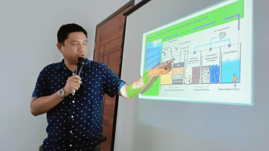 Man explaining recirculating aquaculture system