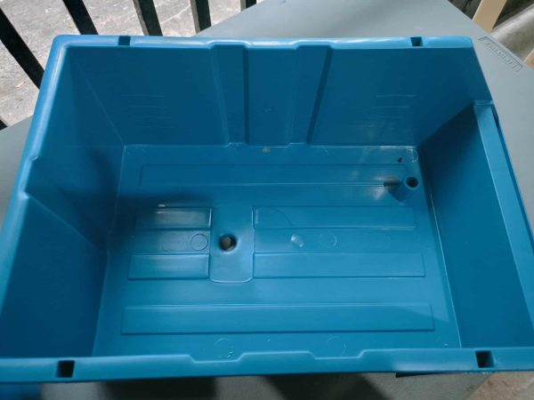 Inside view of local crab packaging box showing secure compartment design.