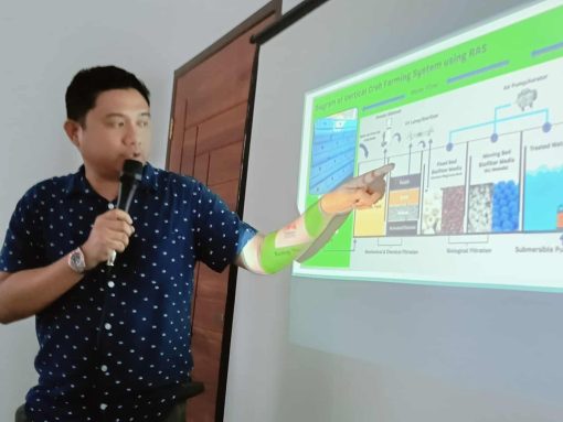 Man explaining recirculating aquaculture system